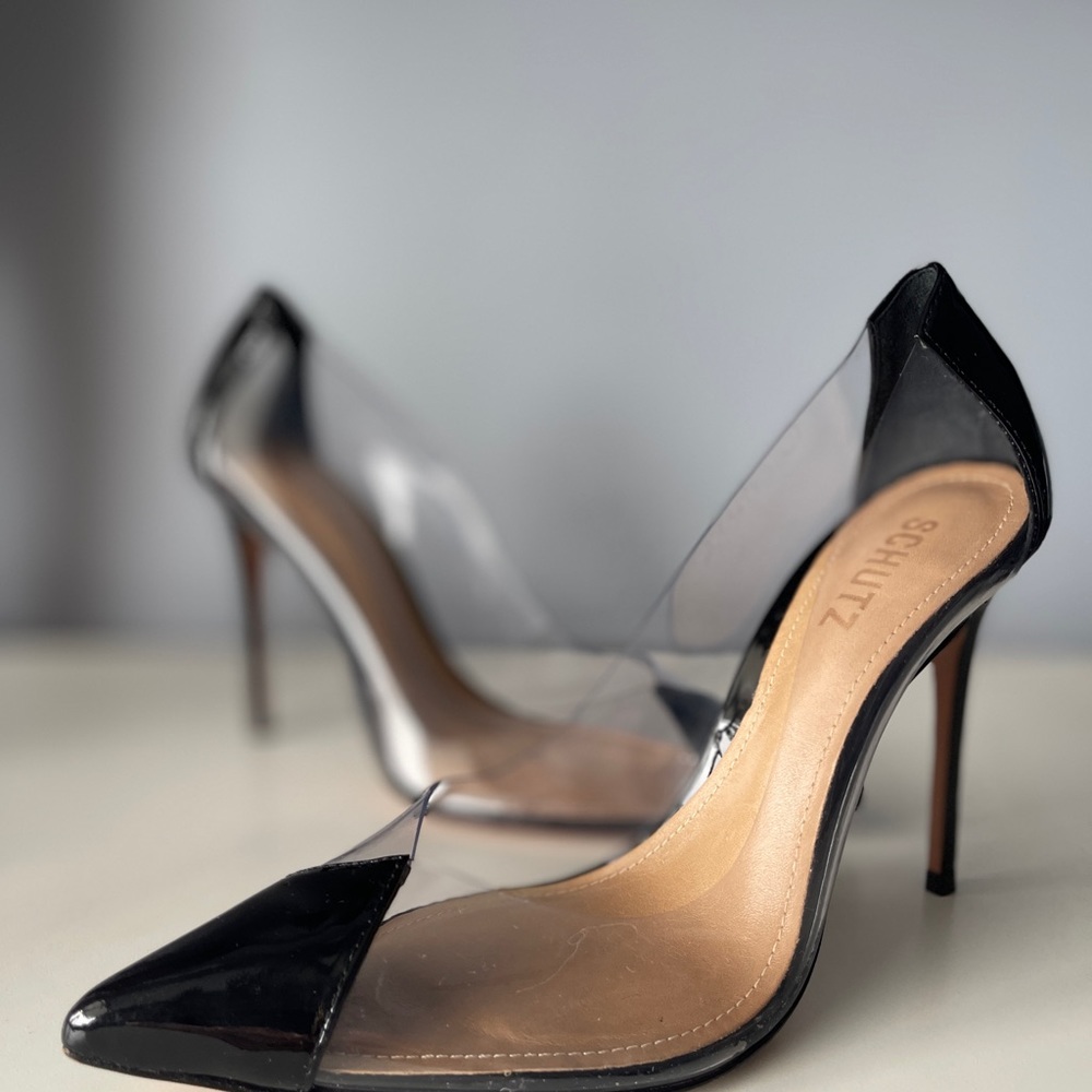 Schutz Stiletto Pumps with vegan black patent leather pointed toe and heel.